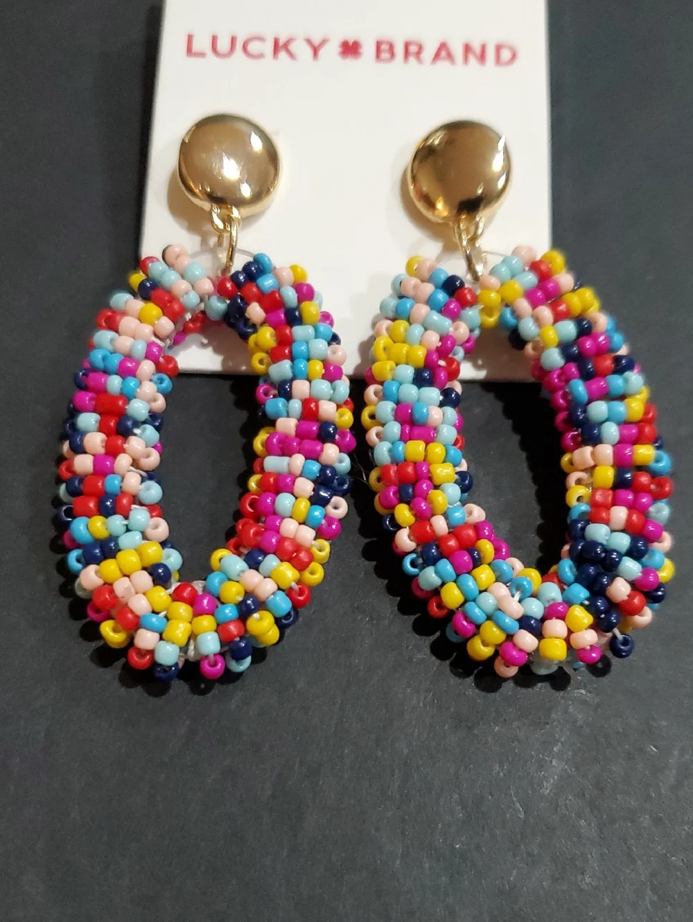 Lucky Brand multi-colored beaded gold stamped oversized oval two tiered earrings